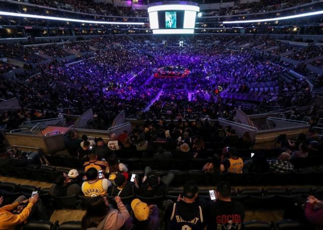 People attend a public memorial for NBA great Kobe Bryant, his daughter Gianna and seven others killed in a helicopter crash on January 26, at the Staples Center in Los Angeles, California, U.S., February 24, 2020. REUTERS/Lucy Nicholson