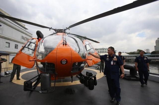 Admiral Joel S. Garcia, Philippine Coast Guard Commandant, inspects one of two new Airbus H145 light twin-engine helicopters from Germany at PCG National Headquarters in Manila on Wednesday, February 26, 2020. The H145 is a 4-ton-class twin-engine helicopter equipped with high-frequency radios, emergency flotation gear, fast roping, cargo sling, searchlight, and electro-optical systems for critical missions including search and rescue, medical evacuation, maritime patrol, and maritime law enforcement. DANNY PATA