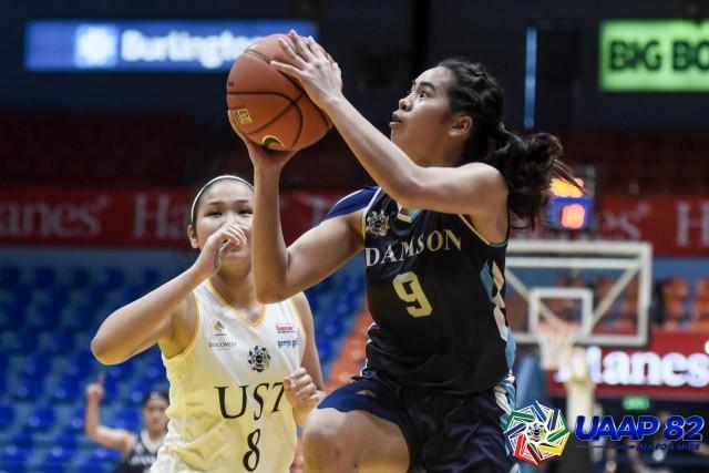 Mia Miguel gets past the defense as Adamson University forces Game 3 against University of Santo Tomas in the UAAP high school girls' basketball finals. Photo from UAAP
