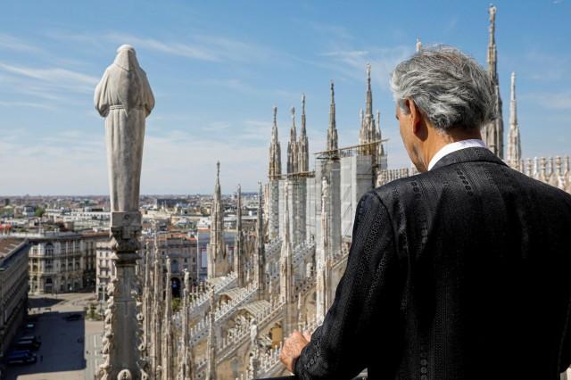 Italian opera singer Andrea Bocelli prepares for the ''Music for hope'' event, a streamed live performance intended as a symbol of love, hope and healing amidst the coronavirus disease (COVID-19) outbreak, on Easter Sunday, near the Duomo Cathedral in Milan, Italy, April 12, 2020. Luca Rossetti/Courtesy Sugar Srl/Decca Records/Handout via REUTERS