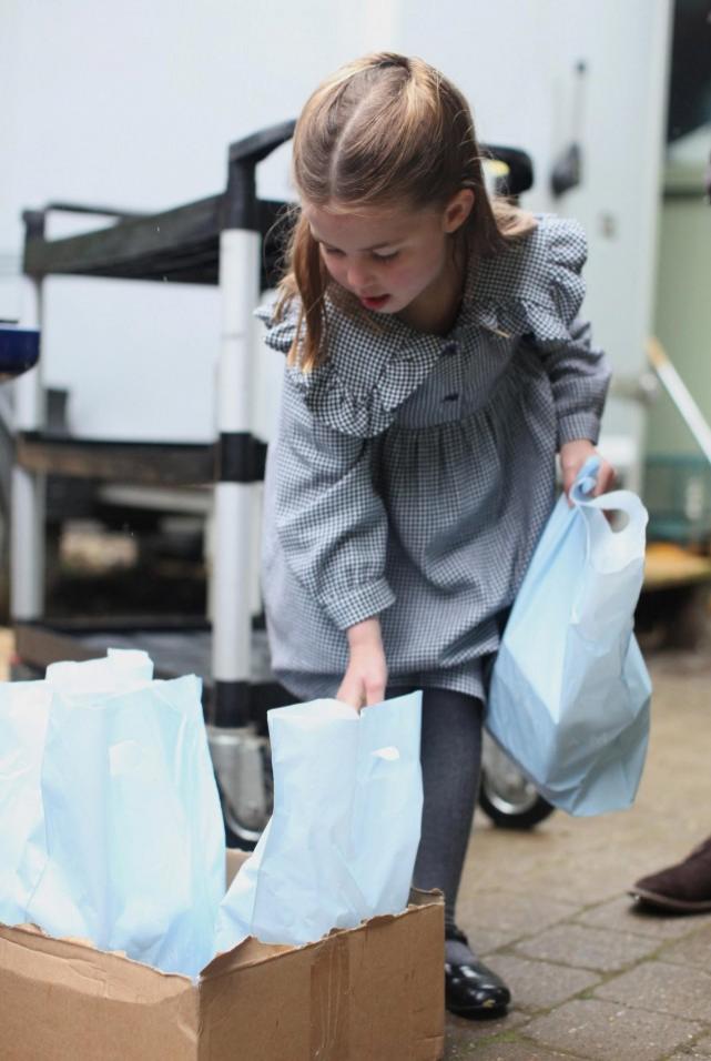 Undated handout photo released by Kensington Palace of Princess Charlotte, who celebrates her fifth birthday Saturday, taken in April by her mother, the Duchess of Cambridge, on the Sandringham Estate, where the family helped to pack up and deliver food packages for isolated pensioners in the local area. Duchess of Cambridge/Handout via REUTERS
