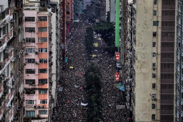 Hundreds of thousands protesters march through the streets of Hong Kong, China, demanding for it's leaders to step down and withdraw the proposed extradition bill on June 16, 2019. Reuters has been awarded the 2020 Pulitzer Prize in Breaking News Photography for Hong Kong protests. REUTERS/Athit Perawongmetha