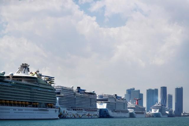 Cruise ships are seen docked at Miami port as the tourism industry is affected by the spread of the coronavirus disease (COVID-19), in Miami, Florida, U.S., March 26, 2020. REUTERS/Carlos Barria/File Photo
