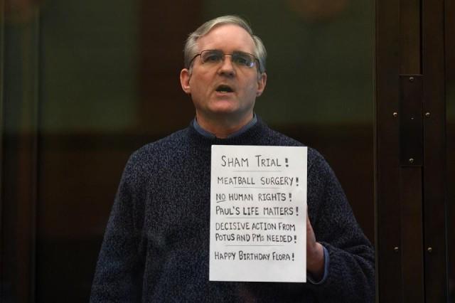 Paul Whelan, a former US marine accused of espionage and arrested in Russia in December 2018, stands inside a defendants' cage as he waits to hear his verdict in Moscow on June 15, 2020. Kirill Kudryavtsev/AFP