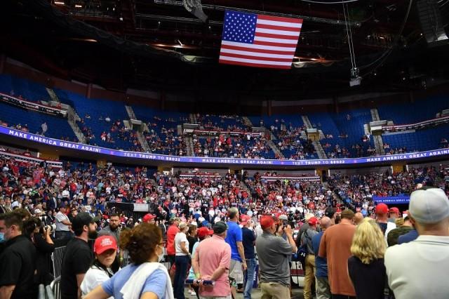 The upper section of the arena is seen partially empty as US President Donald Trump speaks during a campaign rally at the BOK Center on June 20, 2020 in Tulsa, Oklahoma. Hundreds of supporters lined up early for Donald Trump's first political rally in months, saying the risk of contracting COVID-19 in a big, packed arena would not keep them from hearing the president's campaign message. Nicholas Kamm/AFP