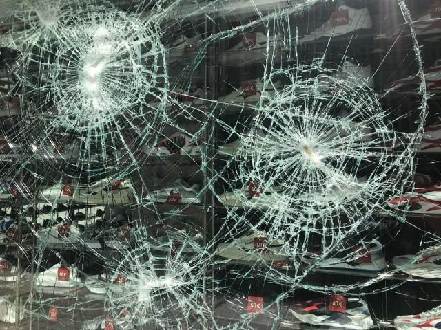 A smashed window is seen in Stuttgart's main shopping street after a group of looters smashed several windows in Stuttgart, Germany, June 21, 2020. REUTERS/Ralph Brock