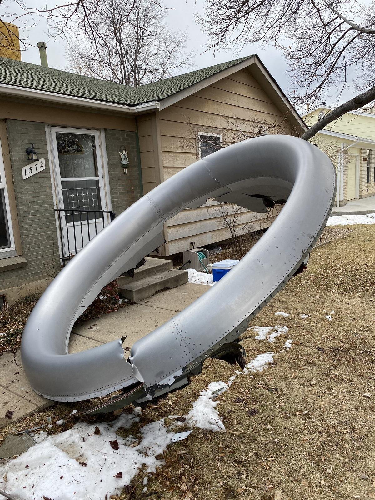 United Airlines airplane's engine in the neighborhood of Broomfield, outside Denver, Colorado, on February 20, 2021. A United Airlines flight suffered a fiery engine failure February 20, shortly after taking off from Denver on its way to Hawaii, dropping massive debris on a residential area before a safe emergency landing, officials said. Broomfield Police Department/AFP