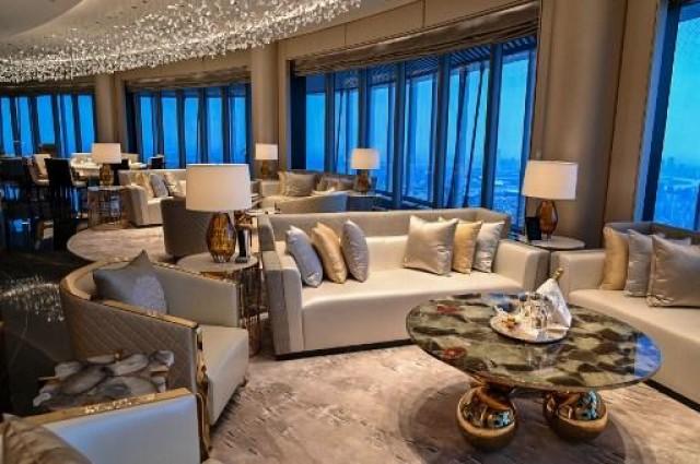 View of a suite room of the J Hotel, the world's highest luxury hotel, boasting a restaurant on the 120th floor and 24-hour personal butler service, located in the Shanghai Tower, in Shanghai on June 23, 2021. Hector RETAMAL / AFP