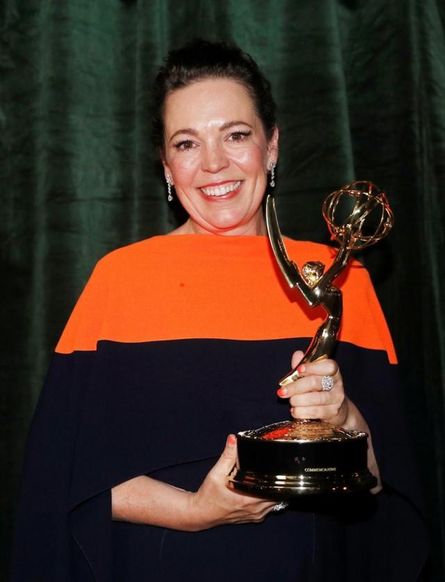 Olivia Colman poses with her Emmy award for Outstanding Lead Actress in a Drama Series, backstage at the Netflix UK Primetime Emmy for "The Crown", in London, Britain, September 20, 2021. REUTERS/Peter Nicholls