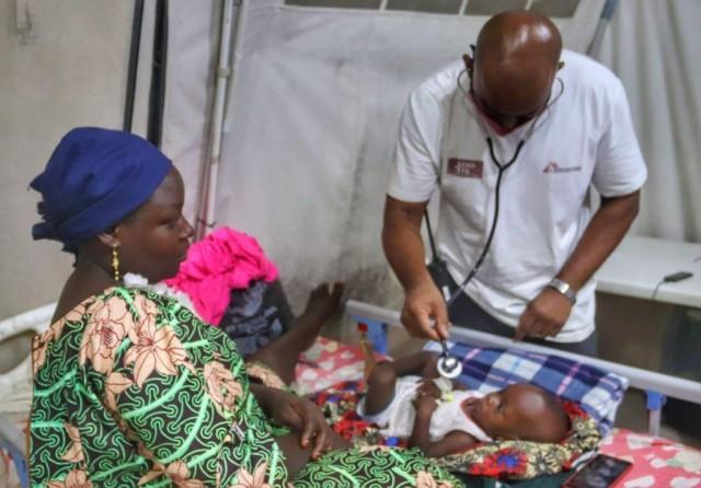 Measles patient admitted at Fori PHC. Photographer: Miroslav Pavicevic