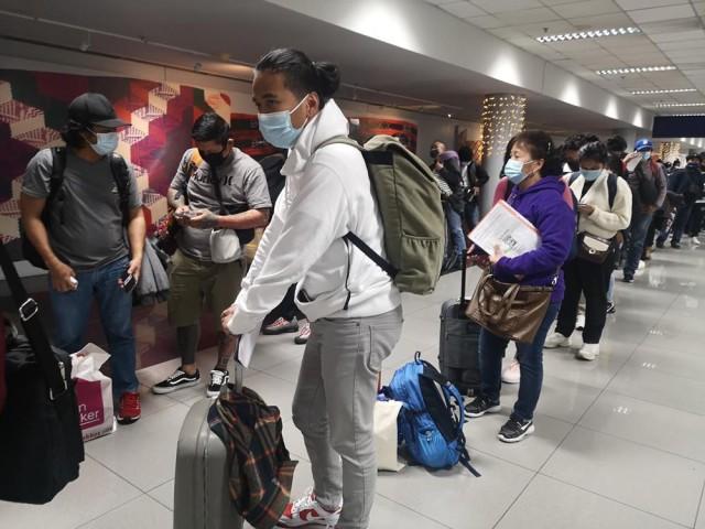 Arriving Filipinos from red list countries were on a different line. Photo: Hon Sofia Balod