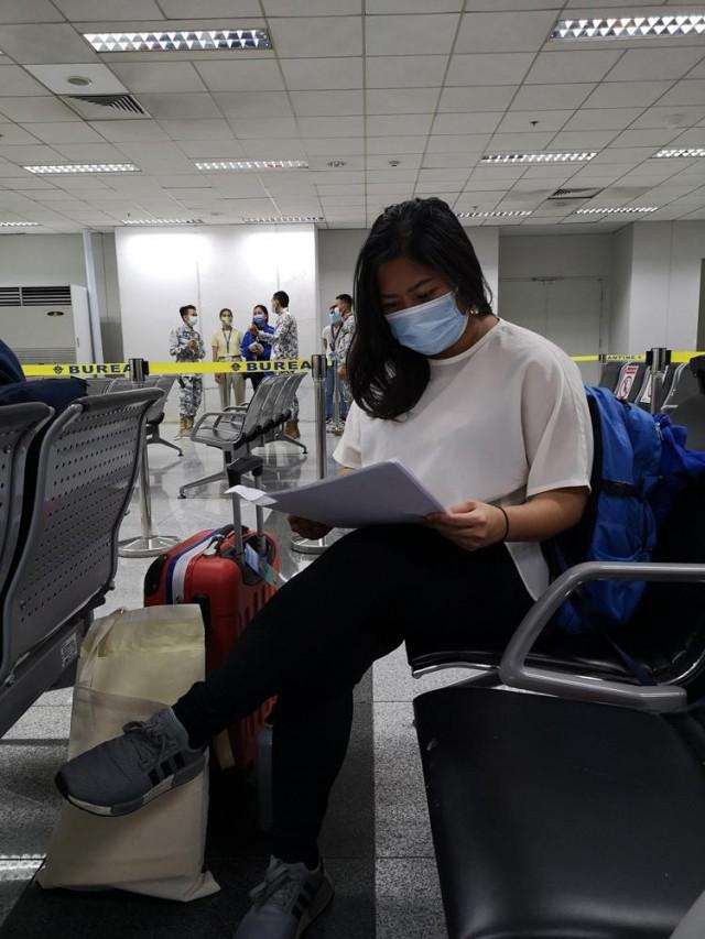 Preparing documents and One Health Pass QR code to show to the Bureau of Quarantine