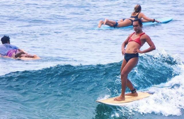Dods Taylor rides the waves of Siargao Island during one of her exhibitions. Photo: Dods Taylor/IG