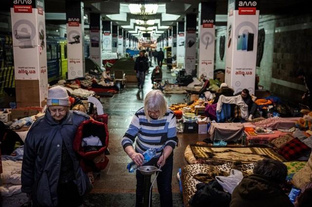 People take shelter and live in an underground metro station in Kharkiv, eastern Ukraine, on April 30, 2022. Dimitar Dilkoff/ AFP