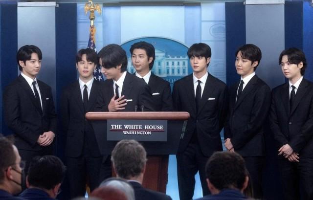 Members of the K-Pop band BTS (not in order) Kim Taehyung, Kim Seokjin, Jeon Jeongguk, Kim Namjoon, Park Jimin, Jung Hoseok and Min Yoon-gi makes statements on anti-Asian hate crimes and for inclusion and representation during the daily briefing at the White House in Washington, U.S., May 31, 2022. REUTERS/Leah Millis