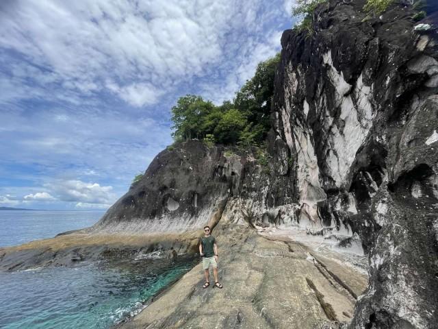 Bisaya-bisaya Island boasts its crystal blue waters and rock formations.