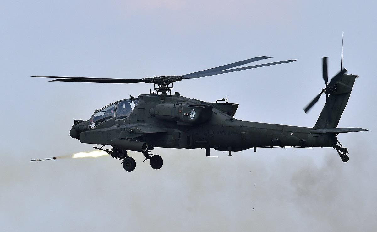 apache helicopter firing rockets