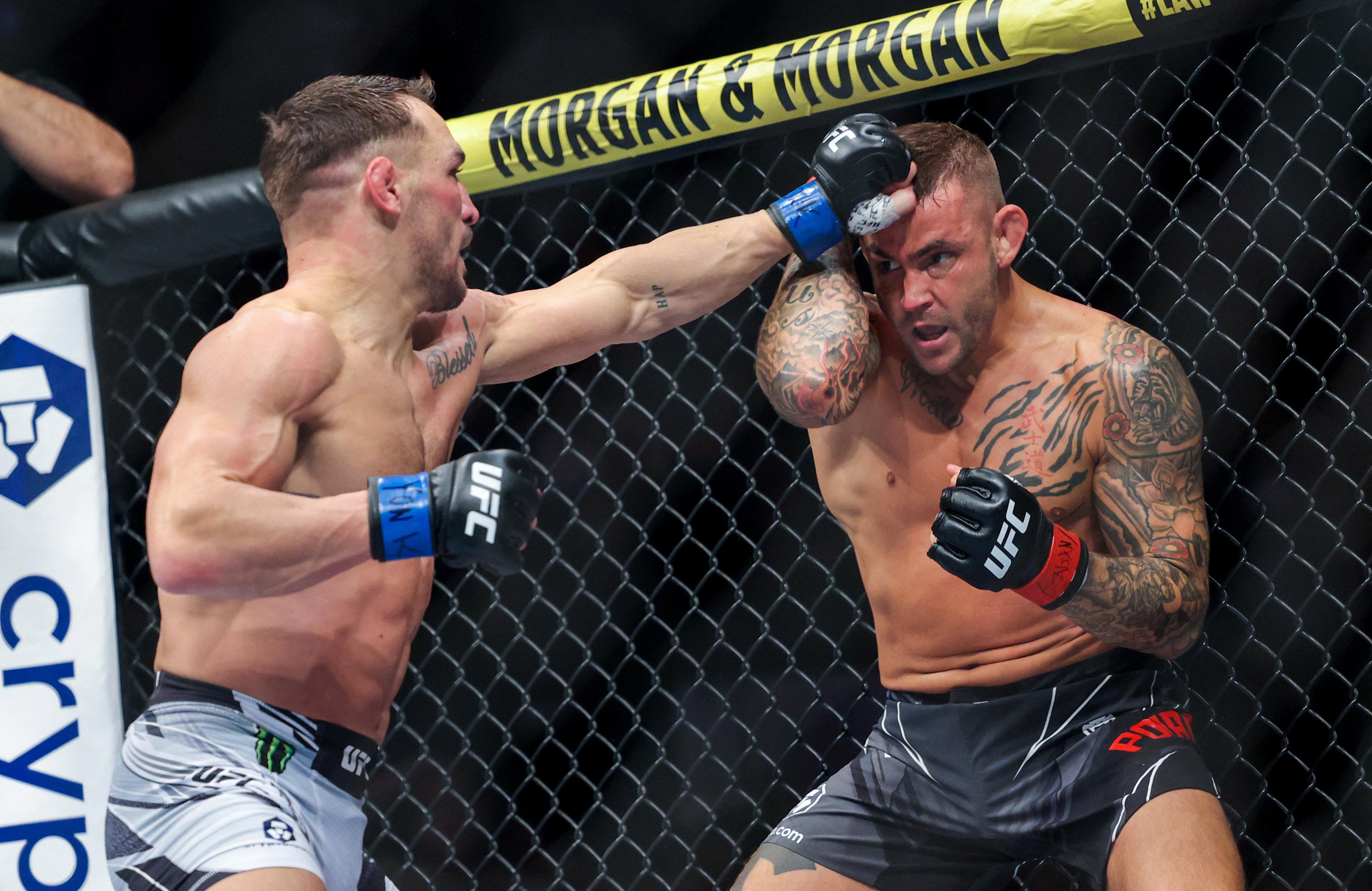 Dustin Poirier submits Michael Chandler in epic encounter at UFC 281 GMA News Online