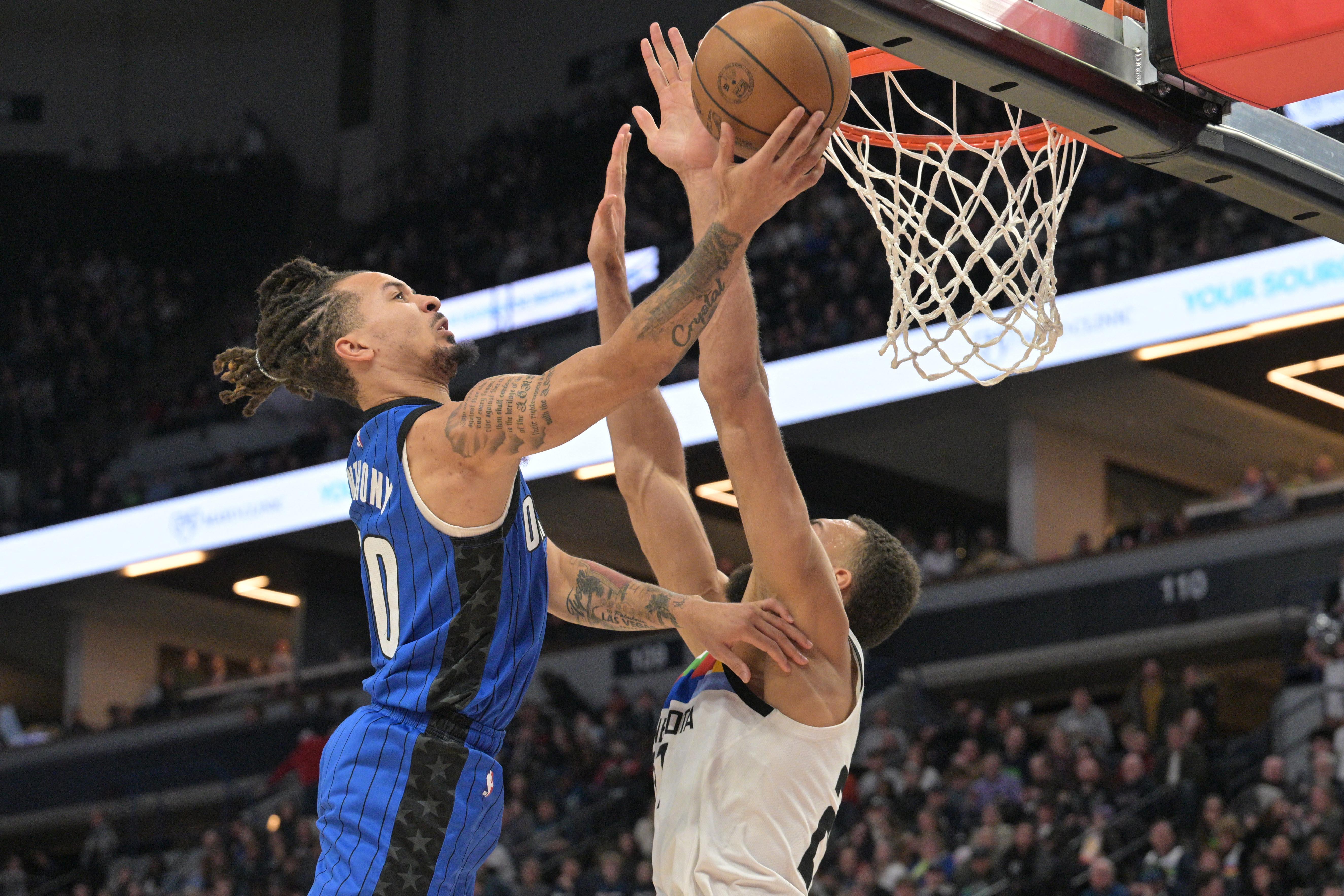 Orlando Magic guard Cole Anthony (50) brings the ball up the court