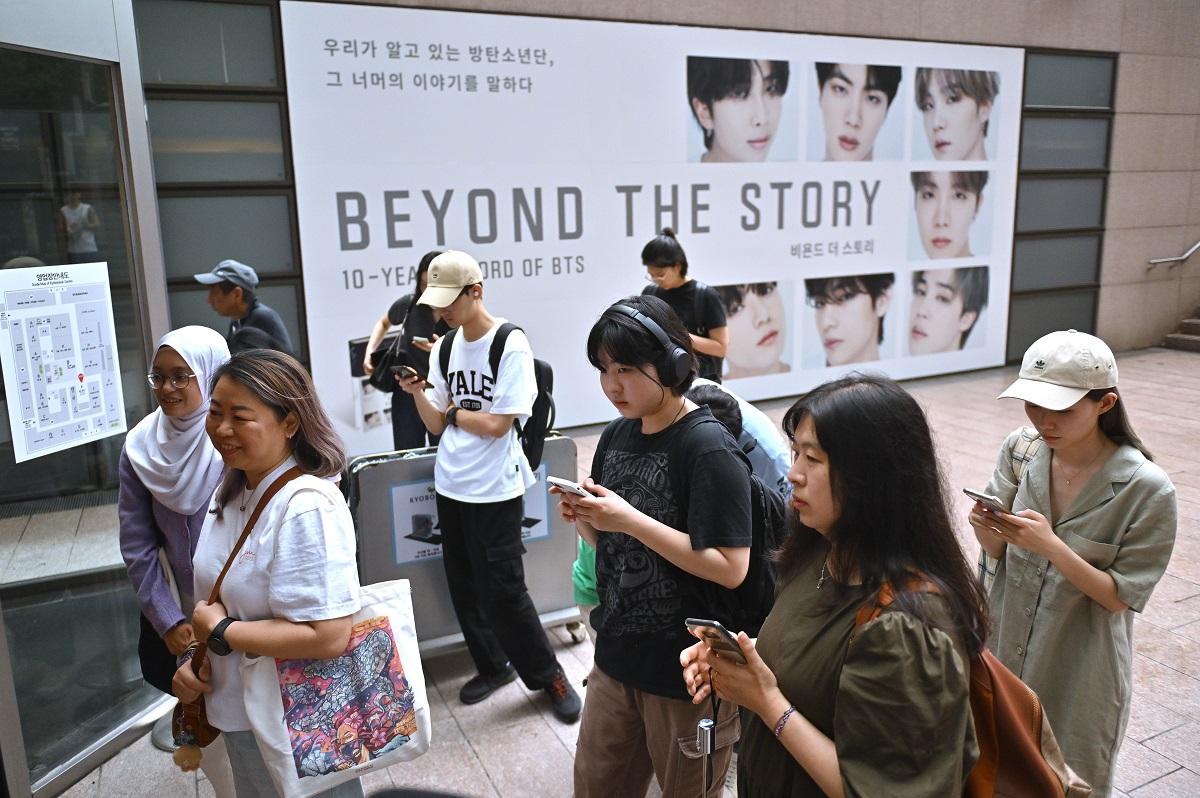 BTS Army Day 2023: Popular K-pop band marks 10 years of fandom with release  of first book 'Beyond the Story