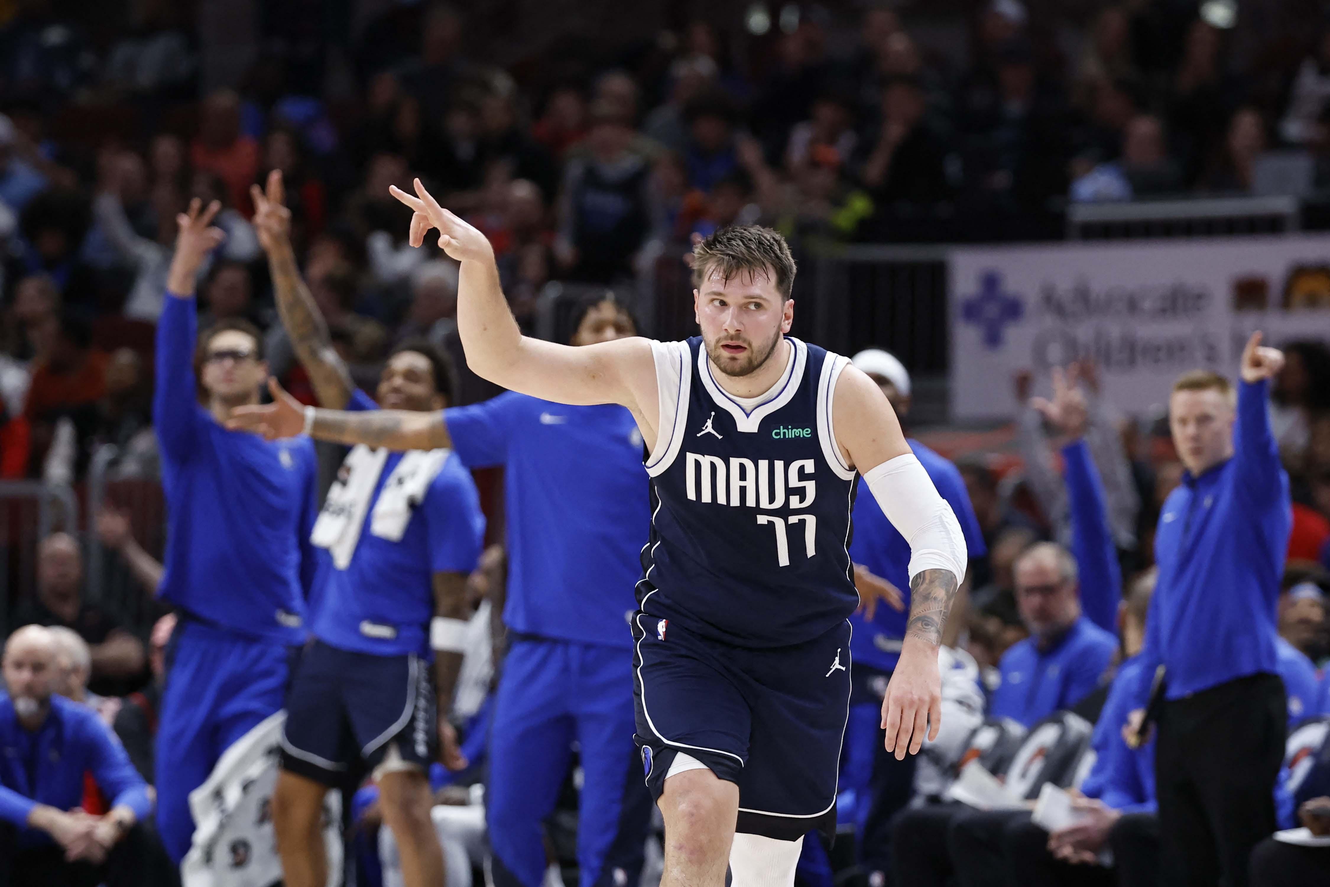 NBA Mavs rout Bulls behind Luka Doncic s 7th straight triple