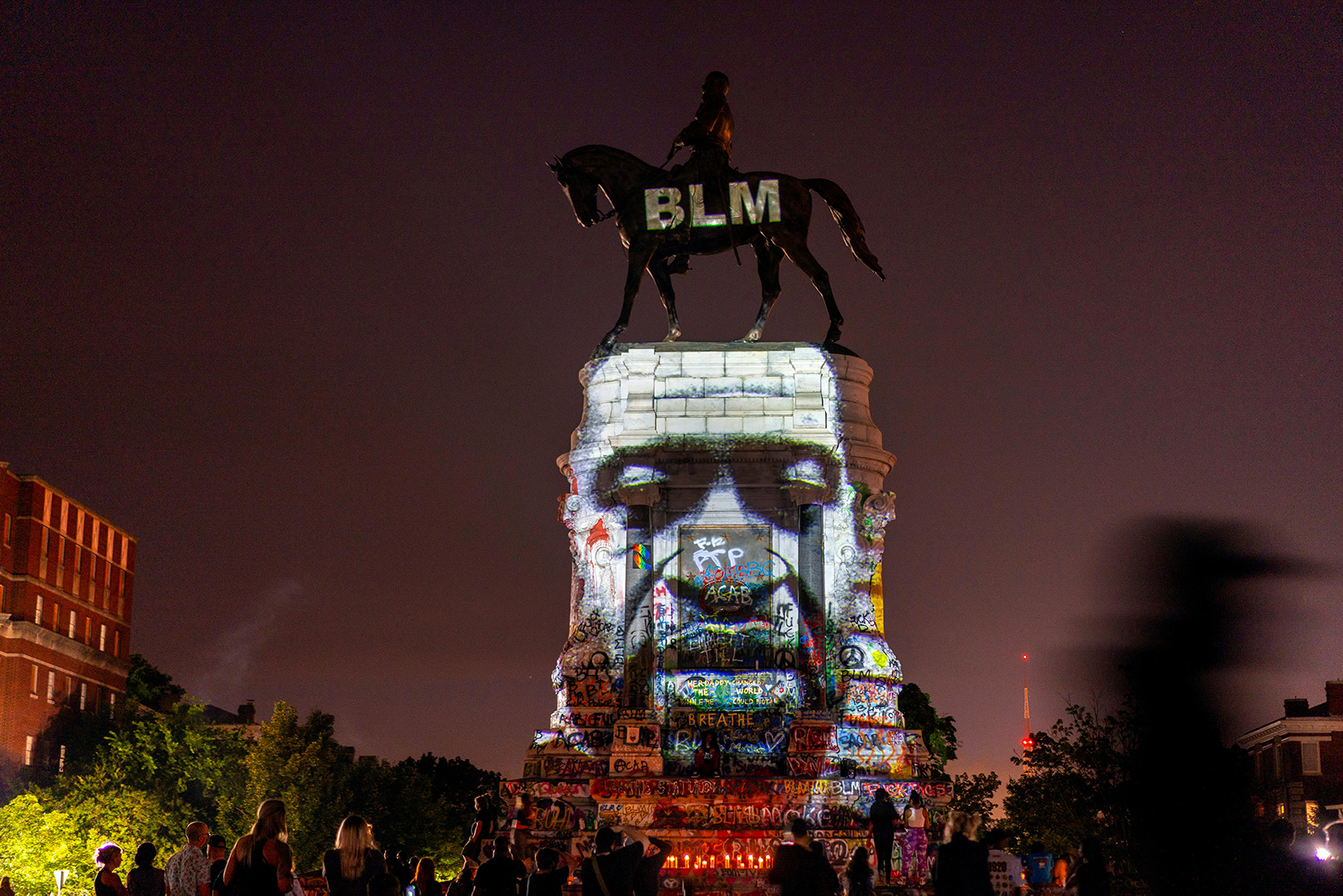 2-An image of George Floyd is projected on the statue of Confederate General Robert E. Lee in Richmond, Virginia, U.S. June 20, 2020.