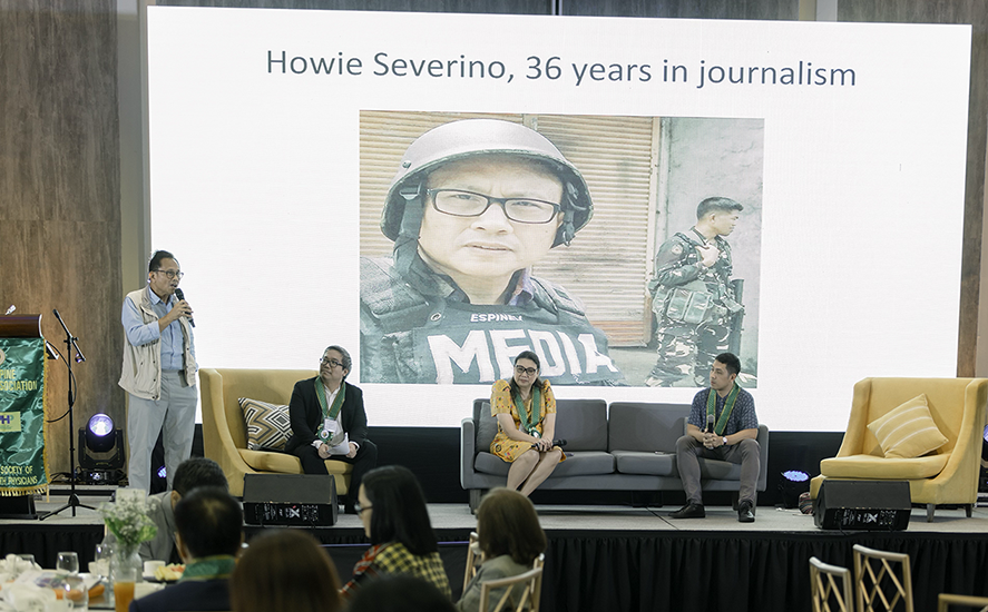 The author (standing) speaks before public health doctors at an event in Cebu City.