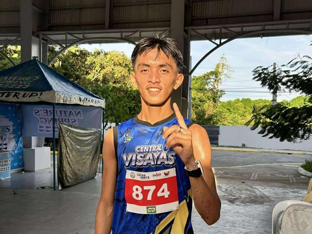 Central Visayas' Jhul Ian Cañalita wins gold, breaks record in 5000m race | Photo: Bea Micaller