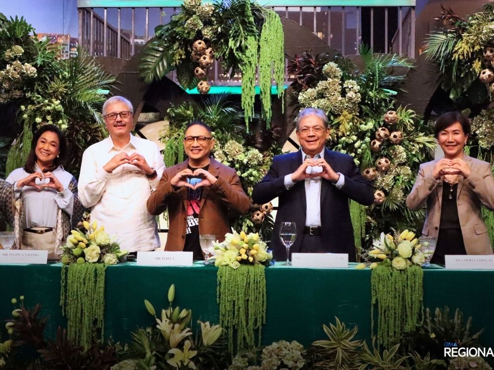 Michael V with GMA executives and his wife during his contract signing | Zane Esparaga