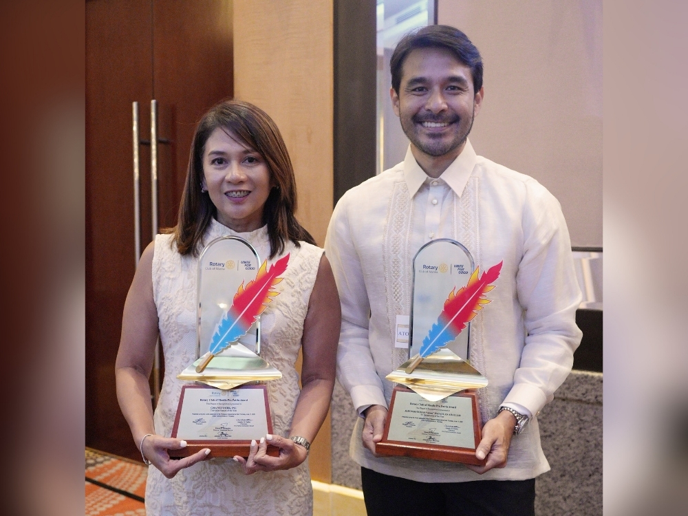 GMA Vice President Michelle Seva and broadcast journalist Atom Araullo | Photo: GMA Network