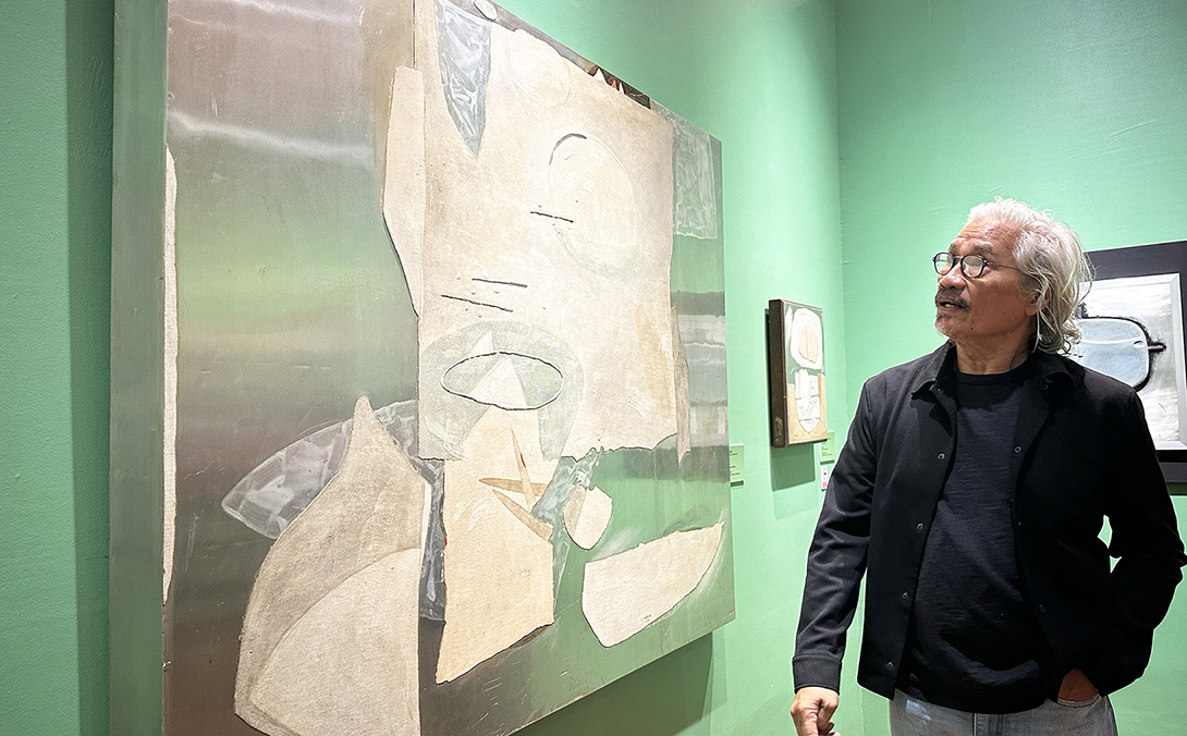 Artist Augusto ‘Gus’ Albor is reunited with his work, 'Panaginip.'