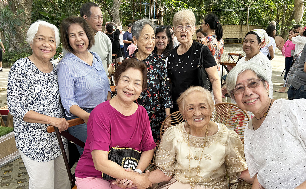 At 94, Violeta (center) can still recognize everybody and recall fun times.