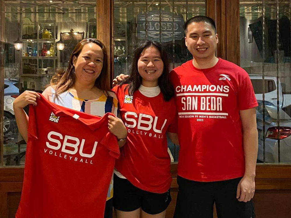 Patricia Hiponia (center), her mother Grace (left), and SBU Lady Red Spikers Asst. Coach Ray Rosales