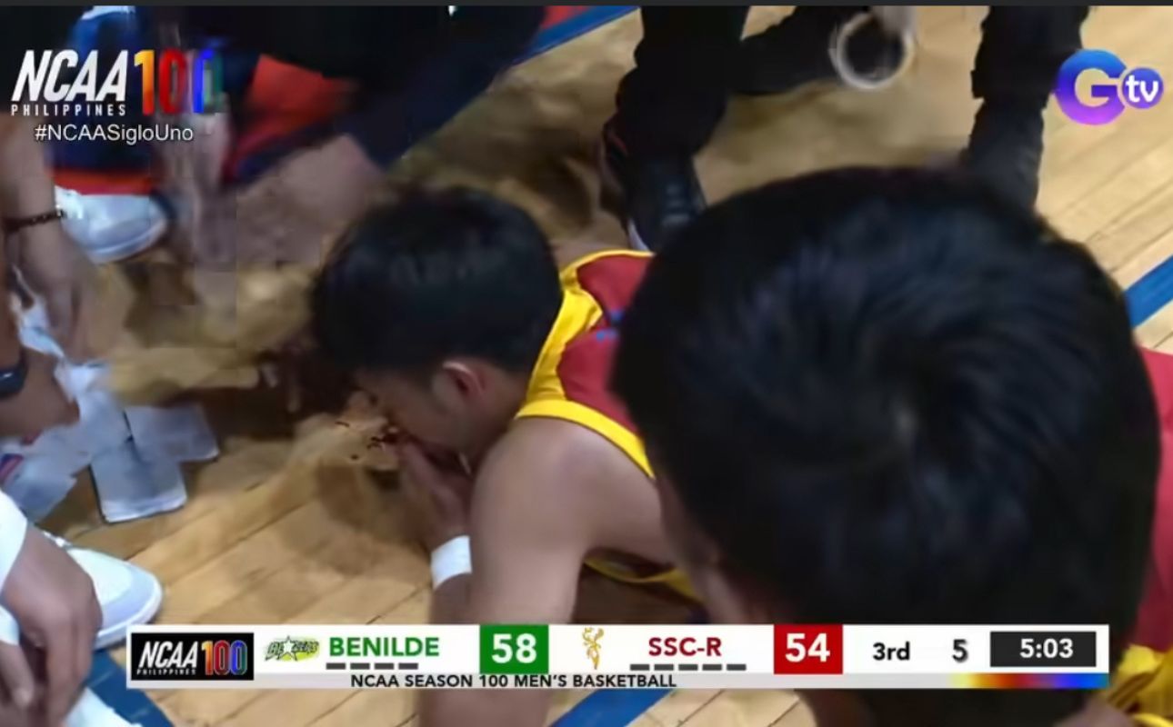 Rafael Are down on the floor after a physical play involving Mark Sangco | Photo: NCAA PH/Youtube