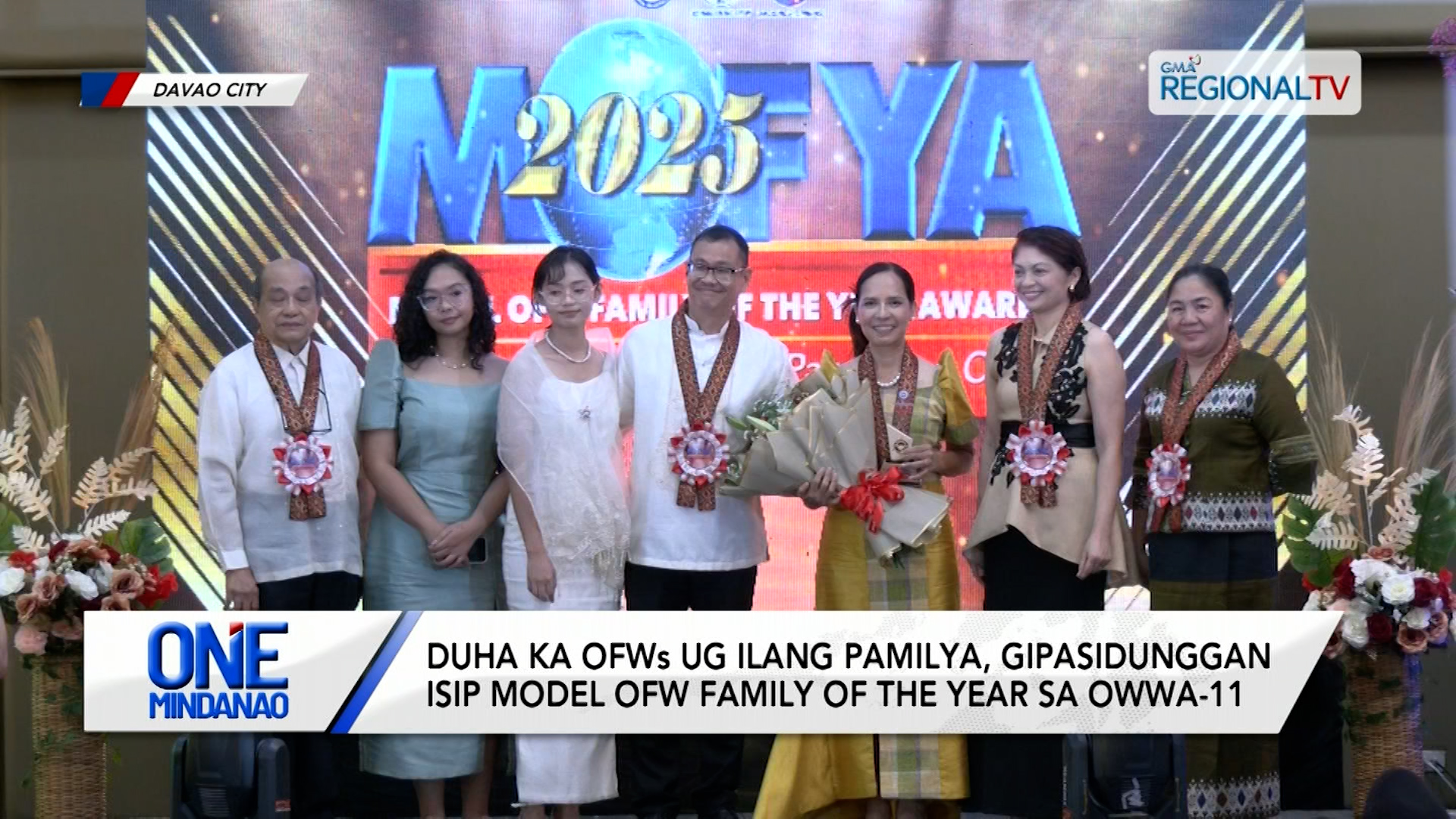 Duha ka OFWs ug ilang pamilya, gipasidunggan sa OWWA-11