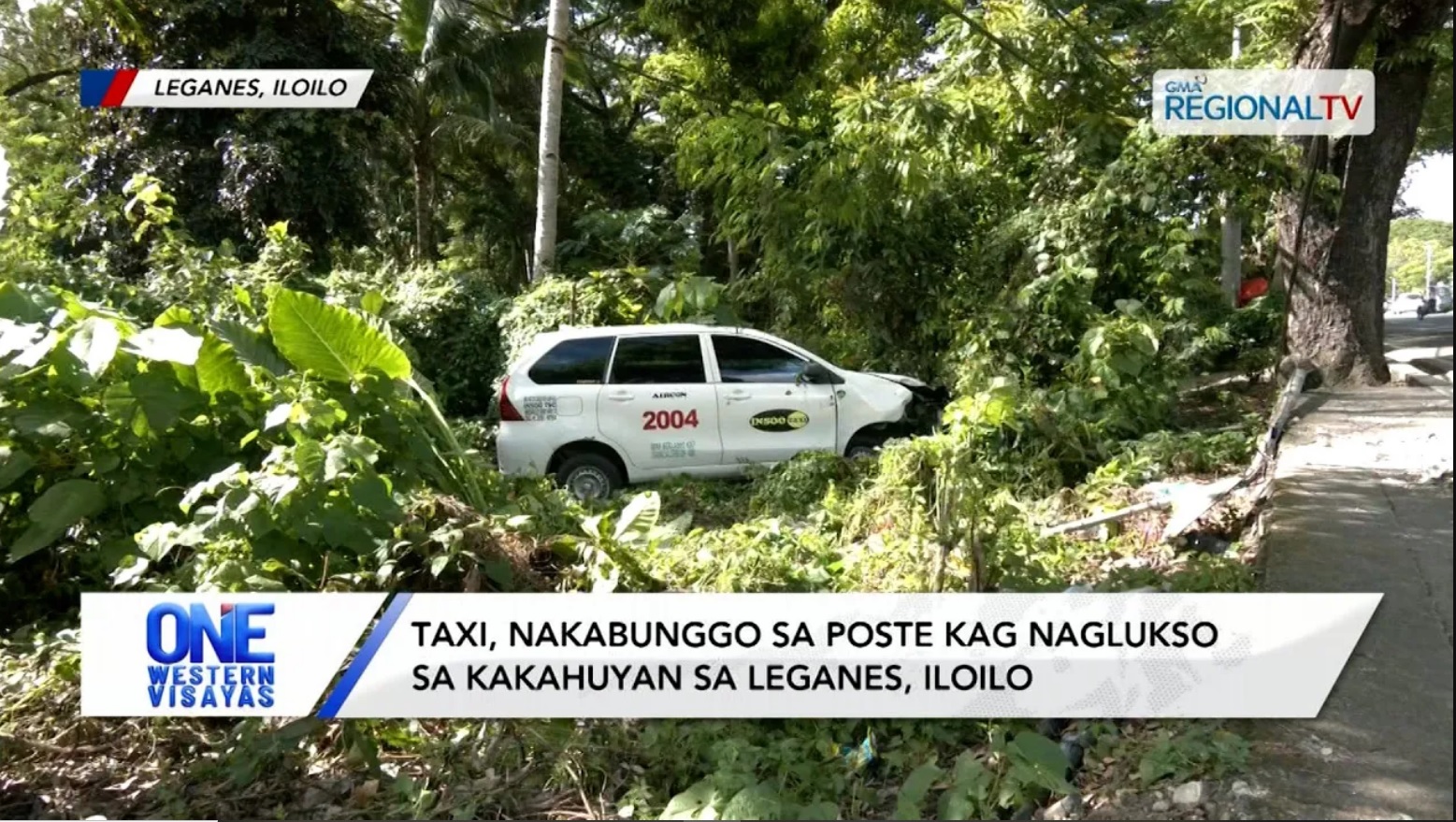 Taxi, nakabunggo sa poste kag naglukso sa kakahuyan sa Leganes, Iloilo