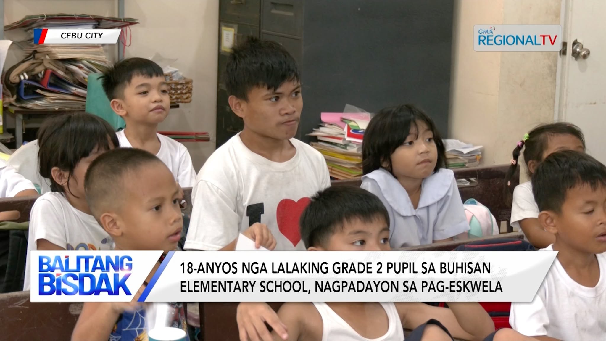 18-anyos nga lalaki nga grade 2 pupil, padayon nga mi-eskwela