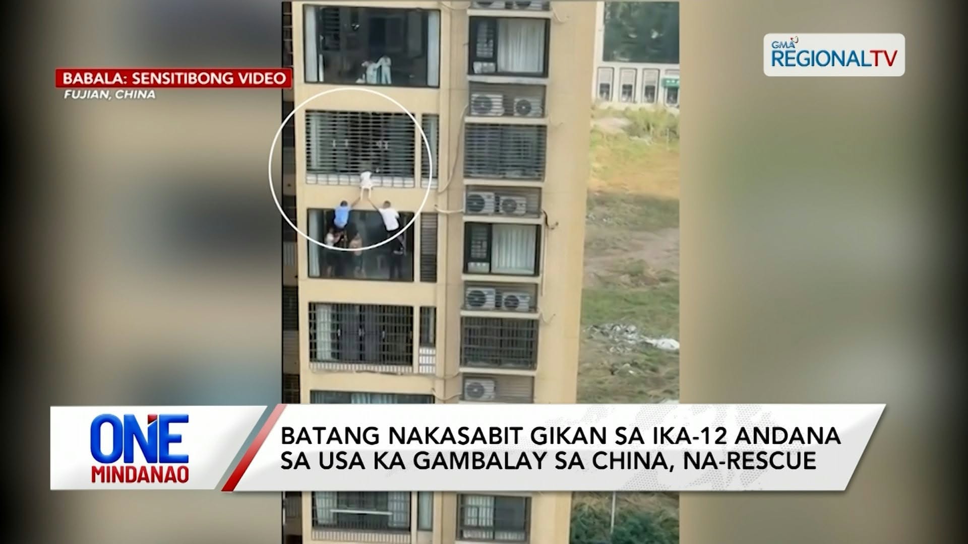 Batang nakasabit gikan sa ika-12 andana sa usa ka gambalay sa China I One Mindanao