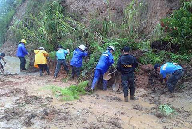 Landslide areas in Benguet cleared of debris | Photos | GMA News Online