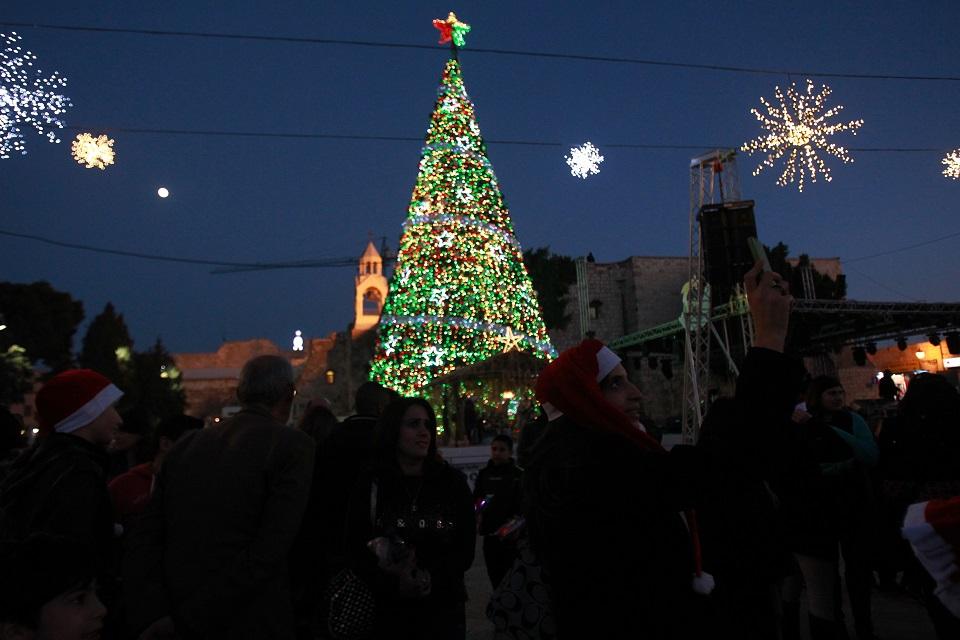 Pilgrims celebrate Christmas in Bethlehem against backdrop of violence ...