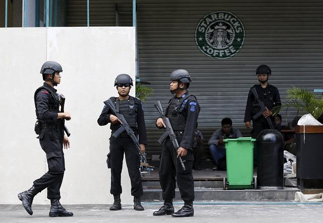 Indonesian police fire tear gas, water cannon at Muslim protesters in ...