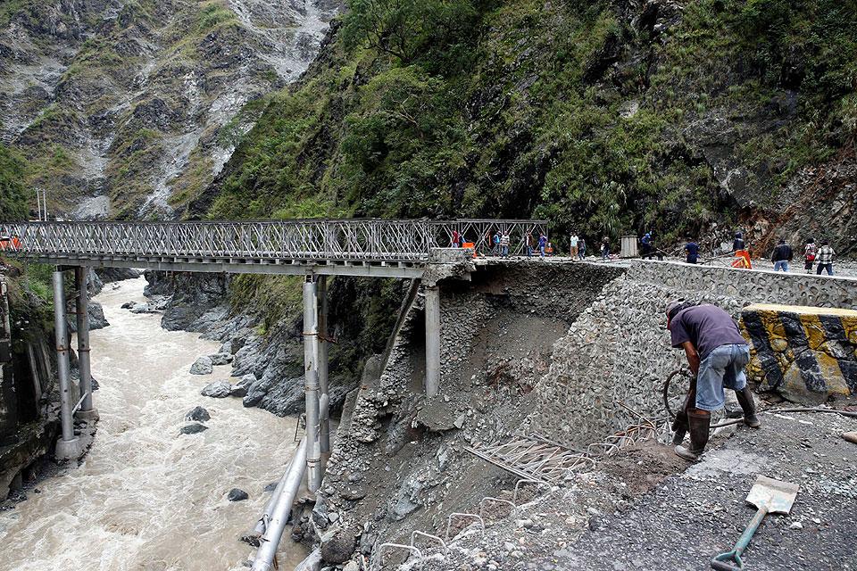 Repair of damaged bridge on Kennon Road rushed - Reuters | Photos | GMA ...