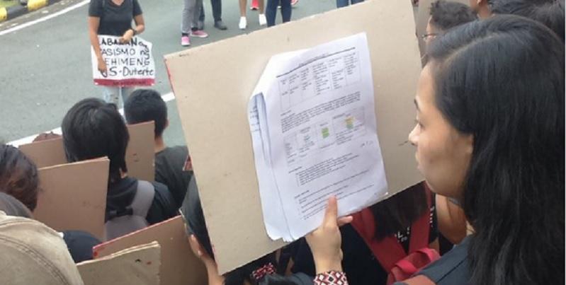 The UP protester reviewing for Bio during rally

