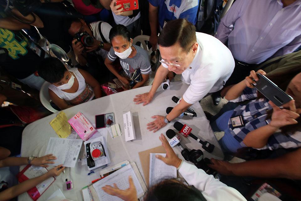 Health Secretary Francisco Duque III conducts an inspection at the