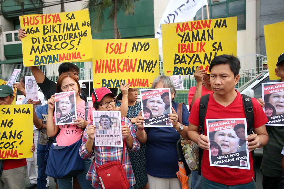 Anti-Marcos group protests delay in issuance of arrest warrant vs ...