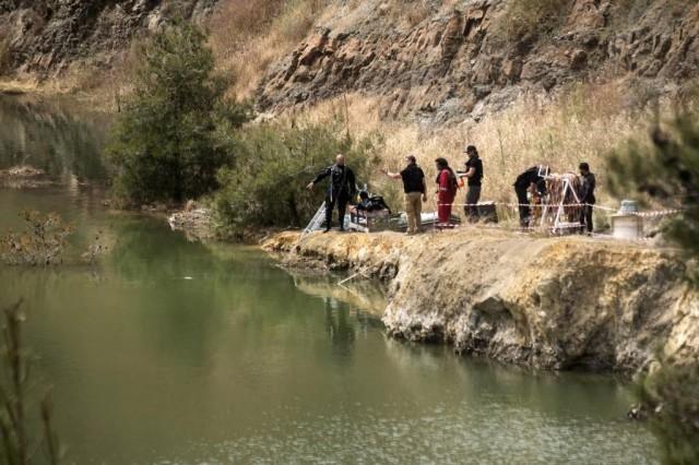 Cyprus forensic police search a suspected dump site in Memi Lake in the village of Xyliantos, southwest of the capital Nicosia on April 26, 2019.. Iakovos Hatzistavrou / AFP