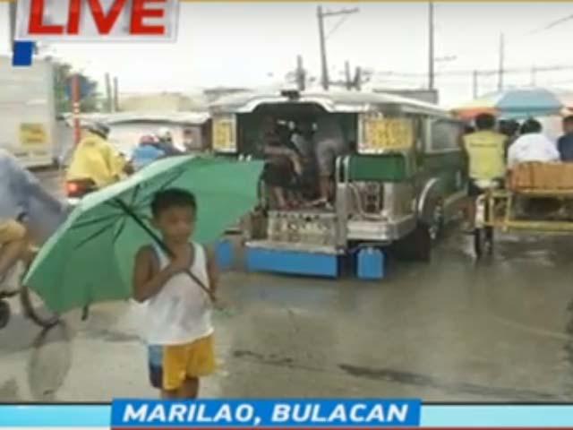 Flood Remains Gutter Deep Along Macarthur Highway In Marilao Bulacan