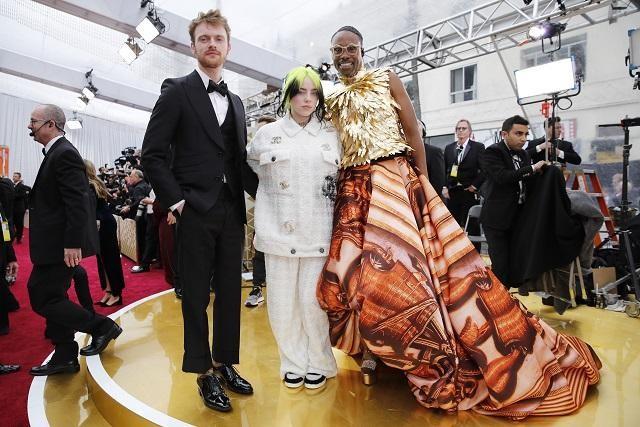 Billie Eilish, Billy Porter show up early on the Oscars red carpet