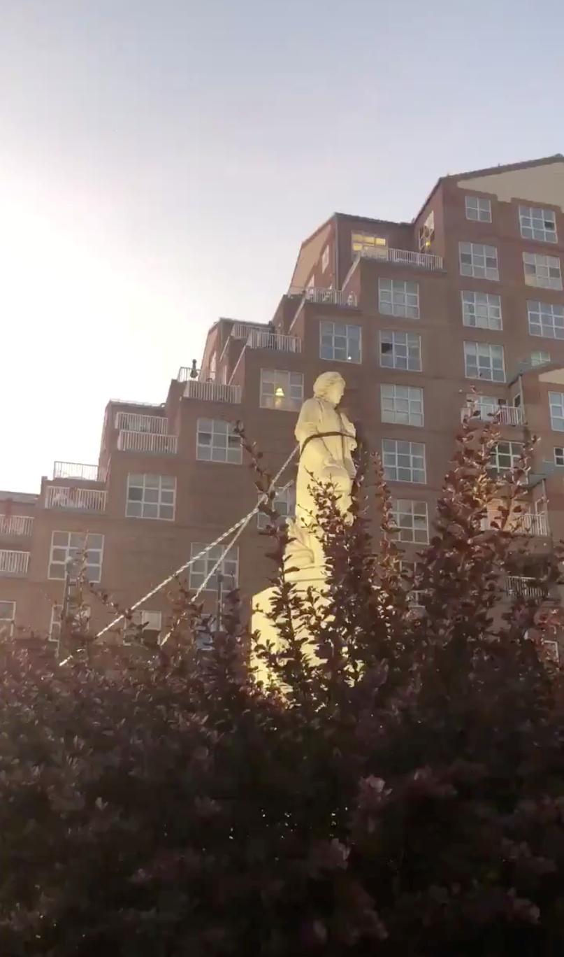 Protesters pull down Columbus statue in Baltimore, Maryland