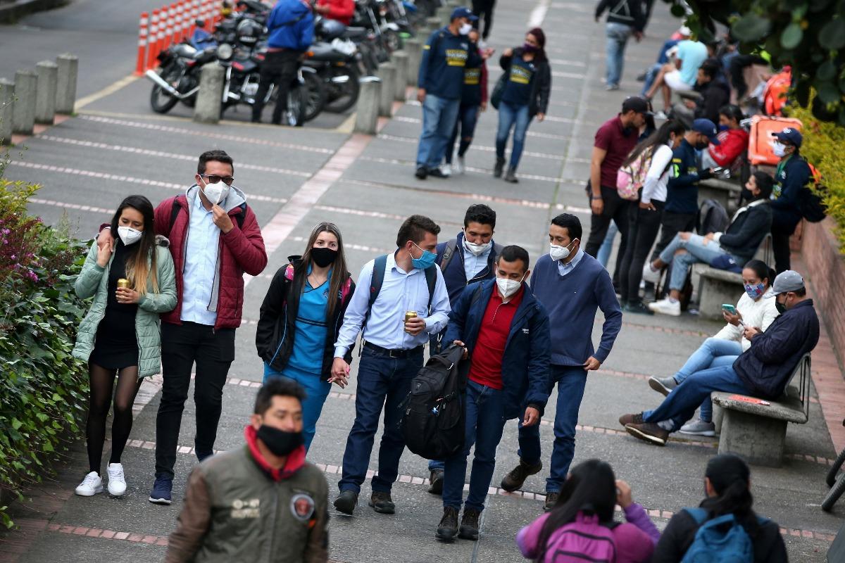 People wear face masks in Colombia